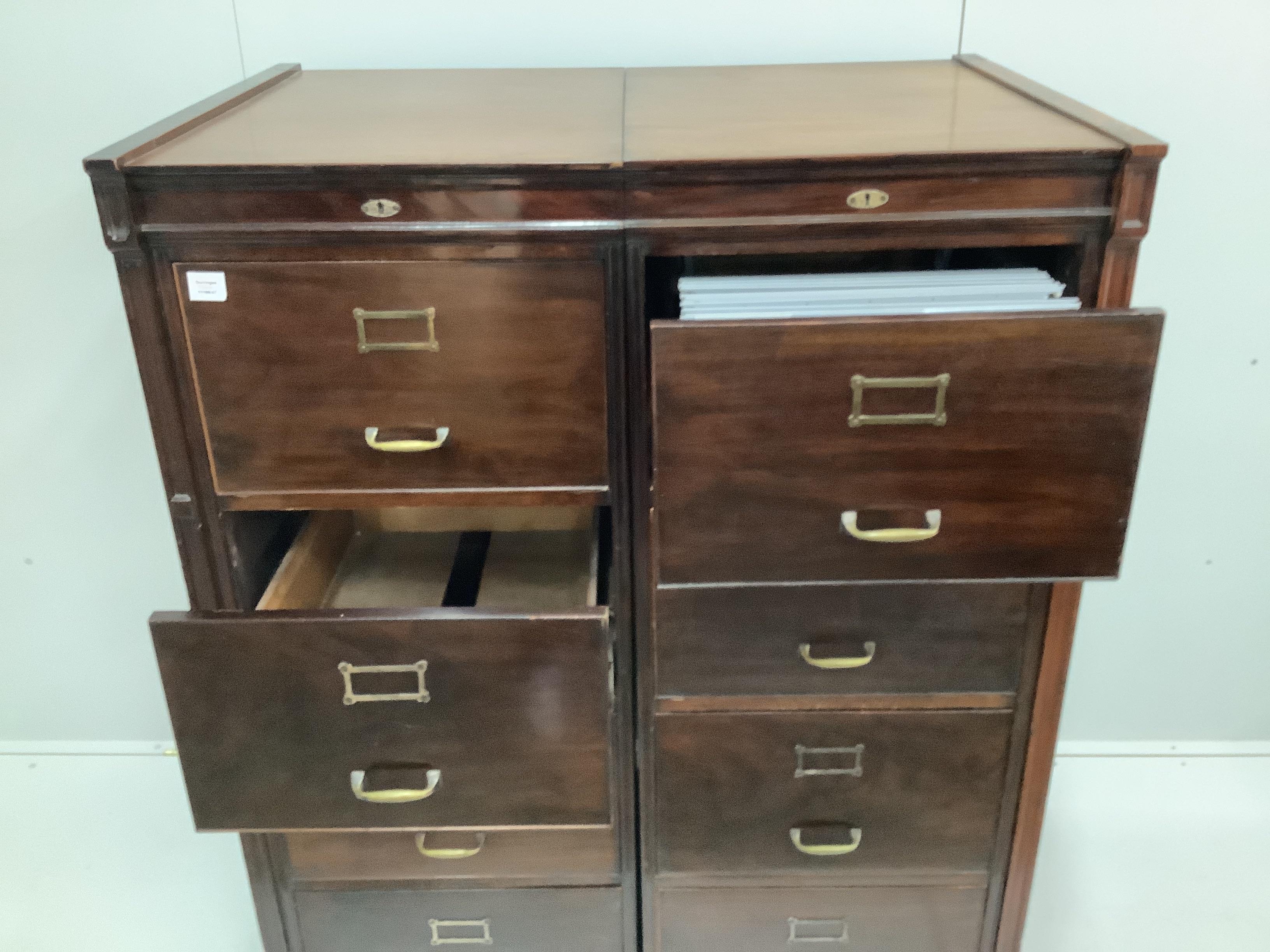An Edwardian mahogany eight drawer double bank filing cabinet, combined width 113cm, depth 75cm, height 146cm. Originally in the ownership of Edwin Waterhouse (1841-1917), co-founder of Price Waterhouse (now Price Waterh
